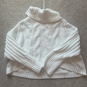 Cropped white turtleneck sweater